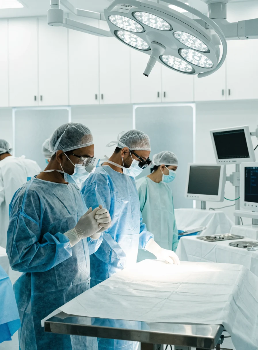 A modern operating theatre with a surgical team